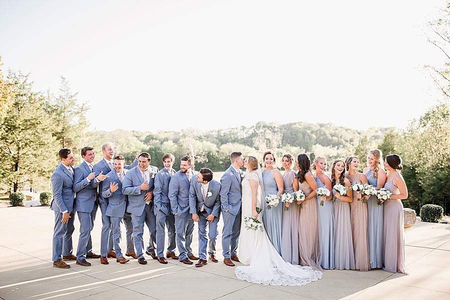 Kissing at this Graystone Quarry wedding by Knoxville Wedding Photographer, Amanda May Photos.