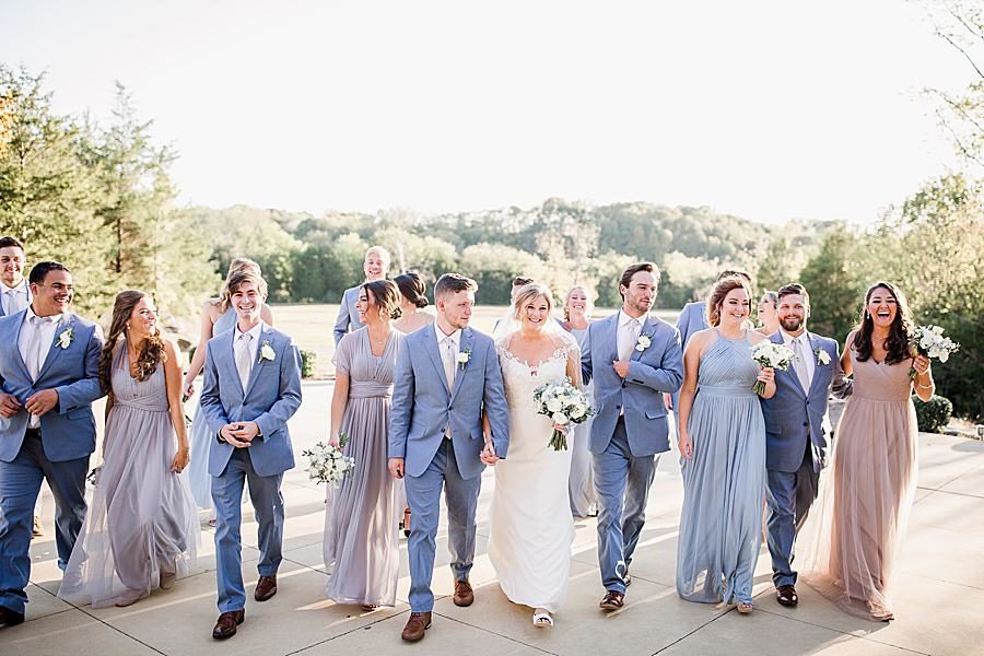 Walking together at this Graystone Quarry wedding by Knoxville Wedding Photographer, Amanda May Photos.