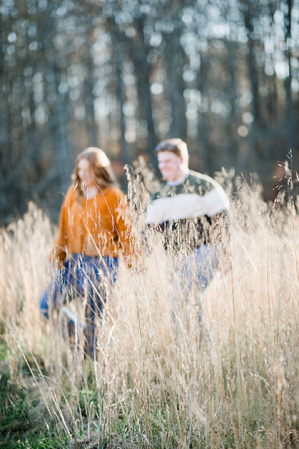tall grass in focus at heartland meadows engagement