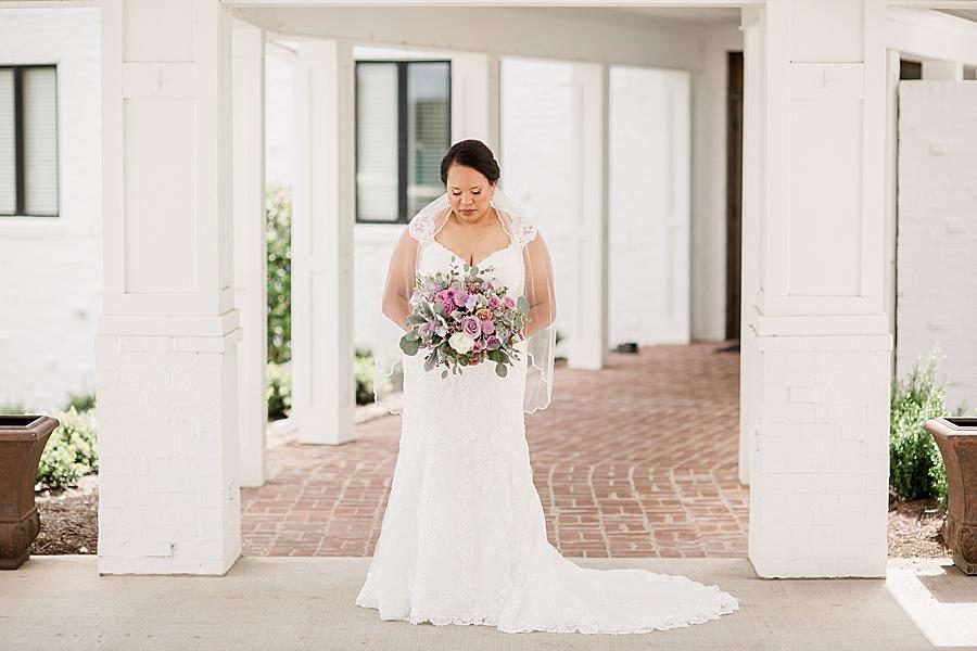 White wedding dress at this Holston Hills Country Club wedding by Knoxville Wedding Photographer, Amanda May Photos.