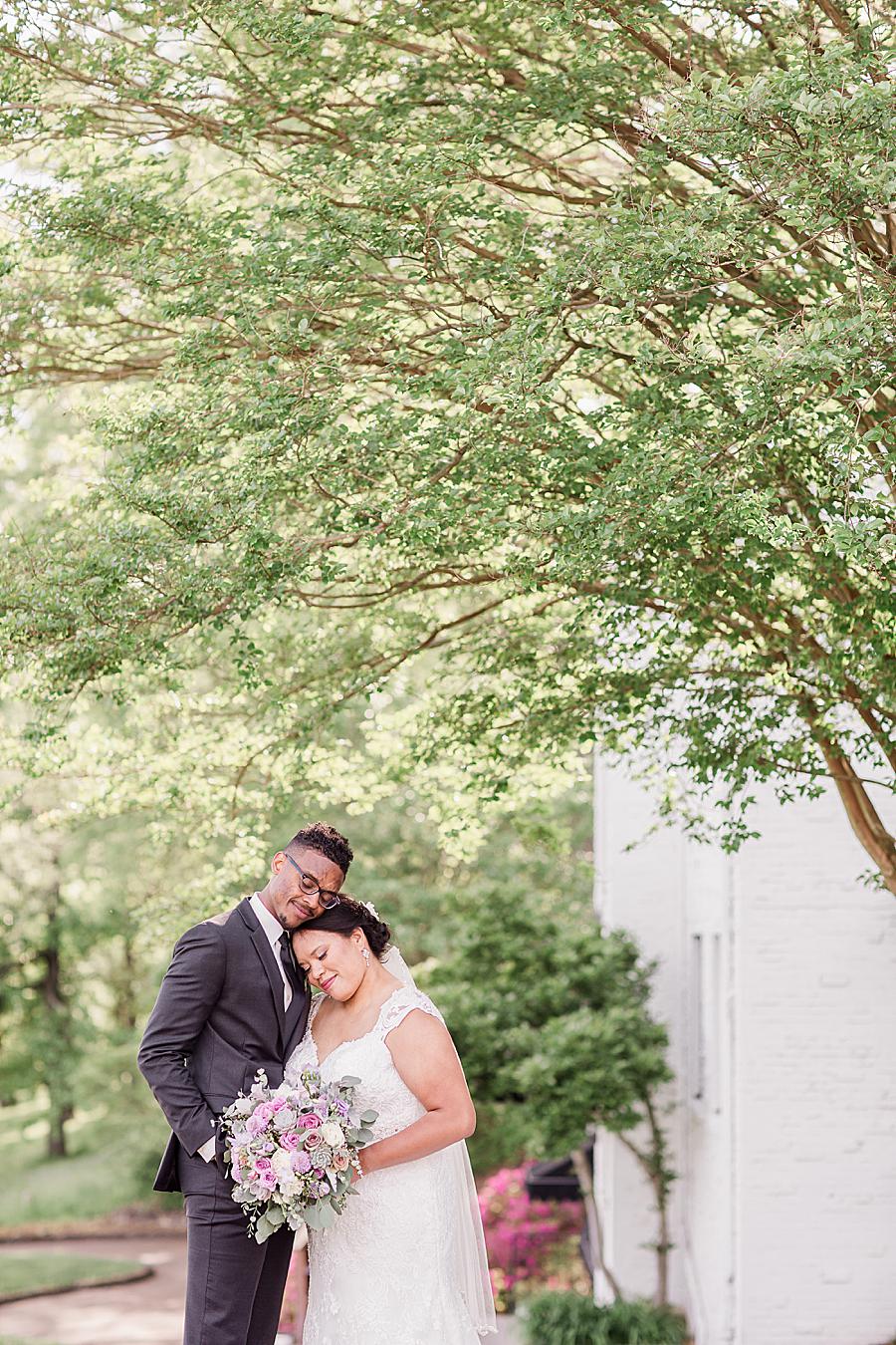 Heads together at this Holston Hills Country Club wedding by Knoxville Wedding Photographer, Amanda May Photos.