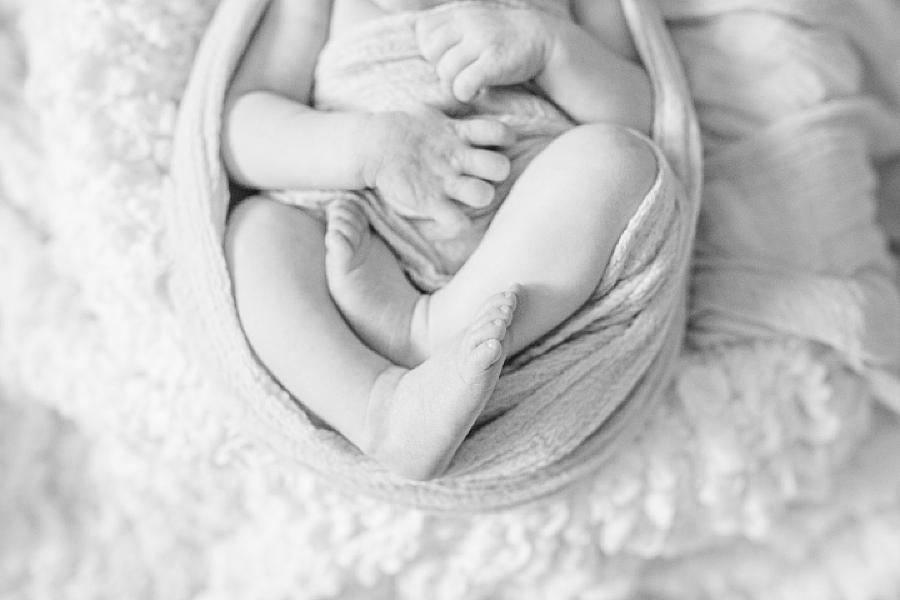 swaddled baby at home newborn