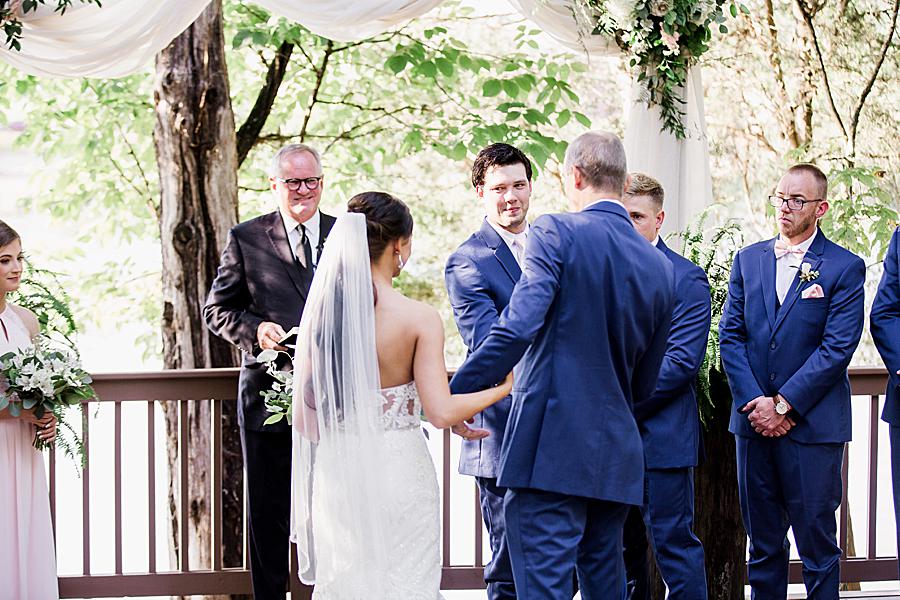 groom shaking hands with father of the bride