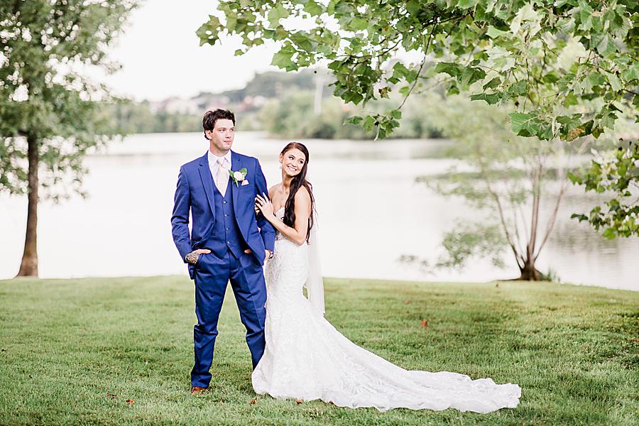 bride and groom in front of water at hunter valley farm wedding
