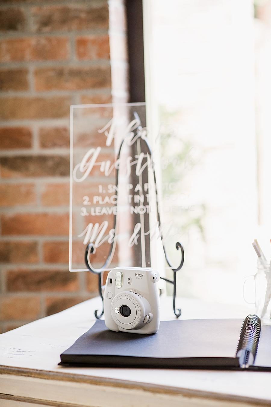 polaroid camera at wedding