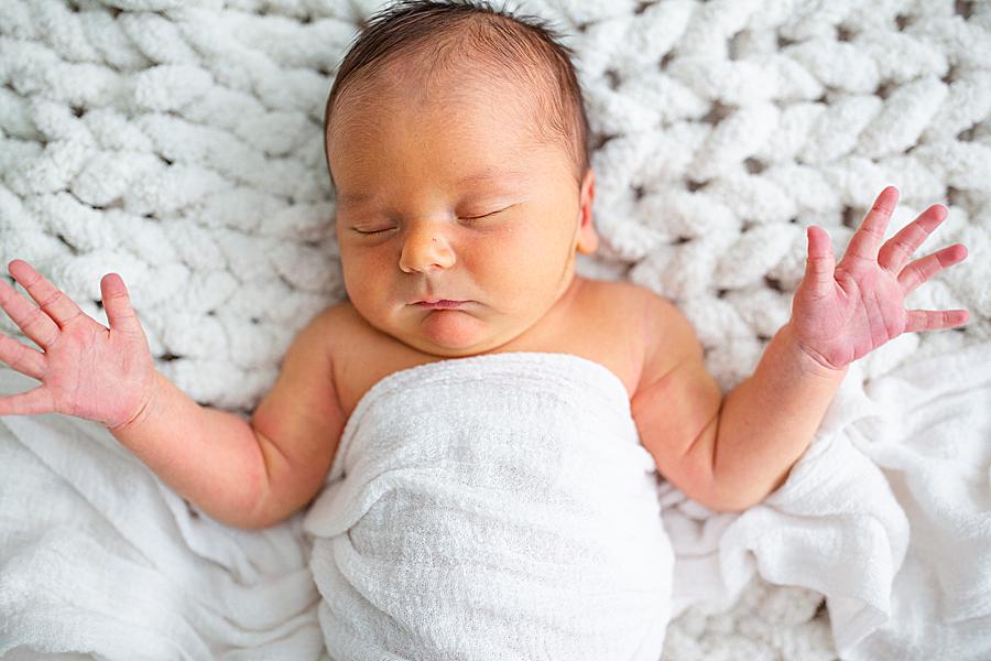 baby with arms out at knoxville newborn session