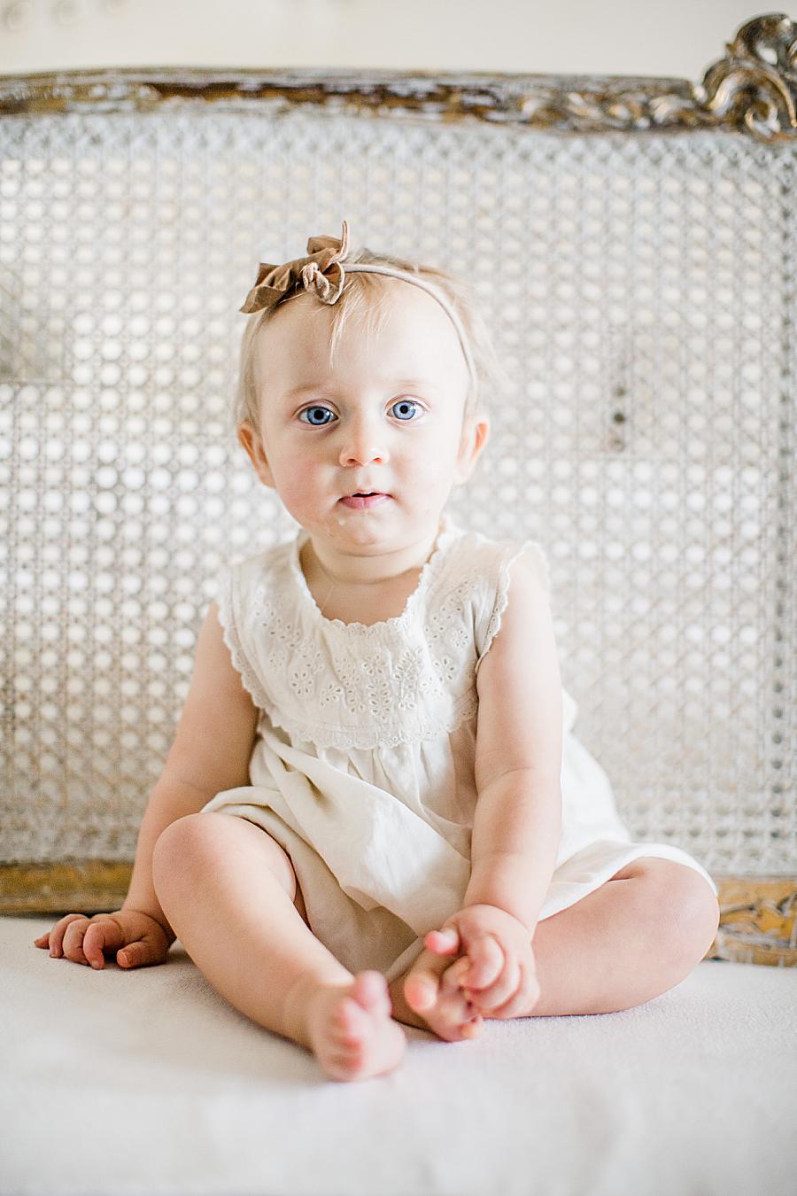 Sitting up at this 12 month lifestyle session by Knoxville Wedding Photographer, Amanda May Photos.