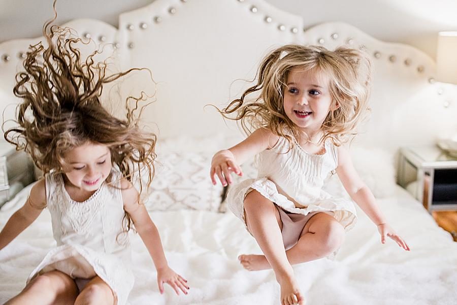 Bouncing at this 12 month lifestyle session by Knoxville Wedding Photographer, Amanda May Photos.