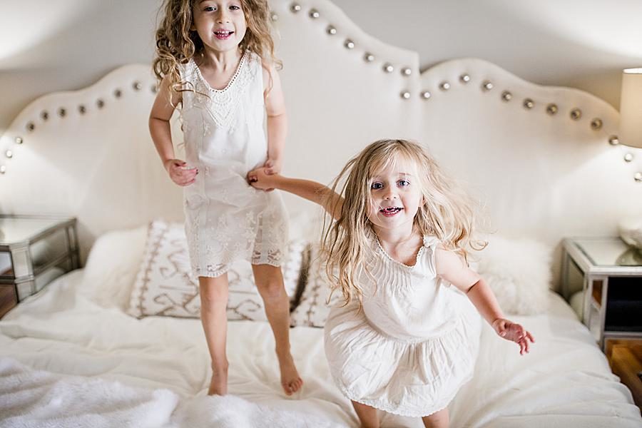 Jumping on the bed by Knoxville Wedding Photographer, Amanda May Photos.
