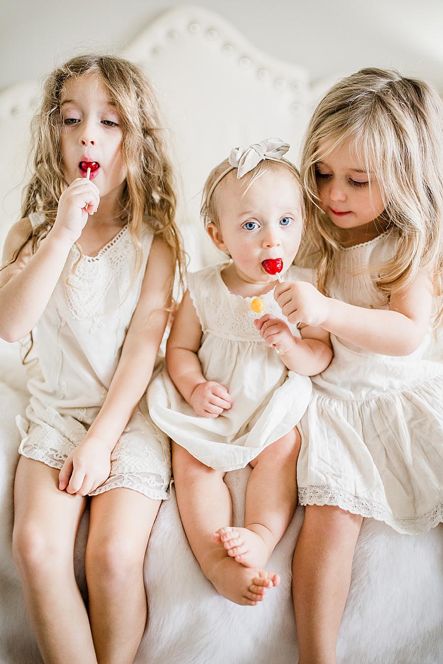 Red lollipop by Knoxville Wedding Photographer, Amanda May Photos.