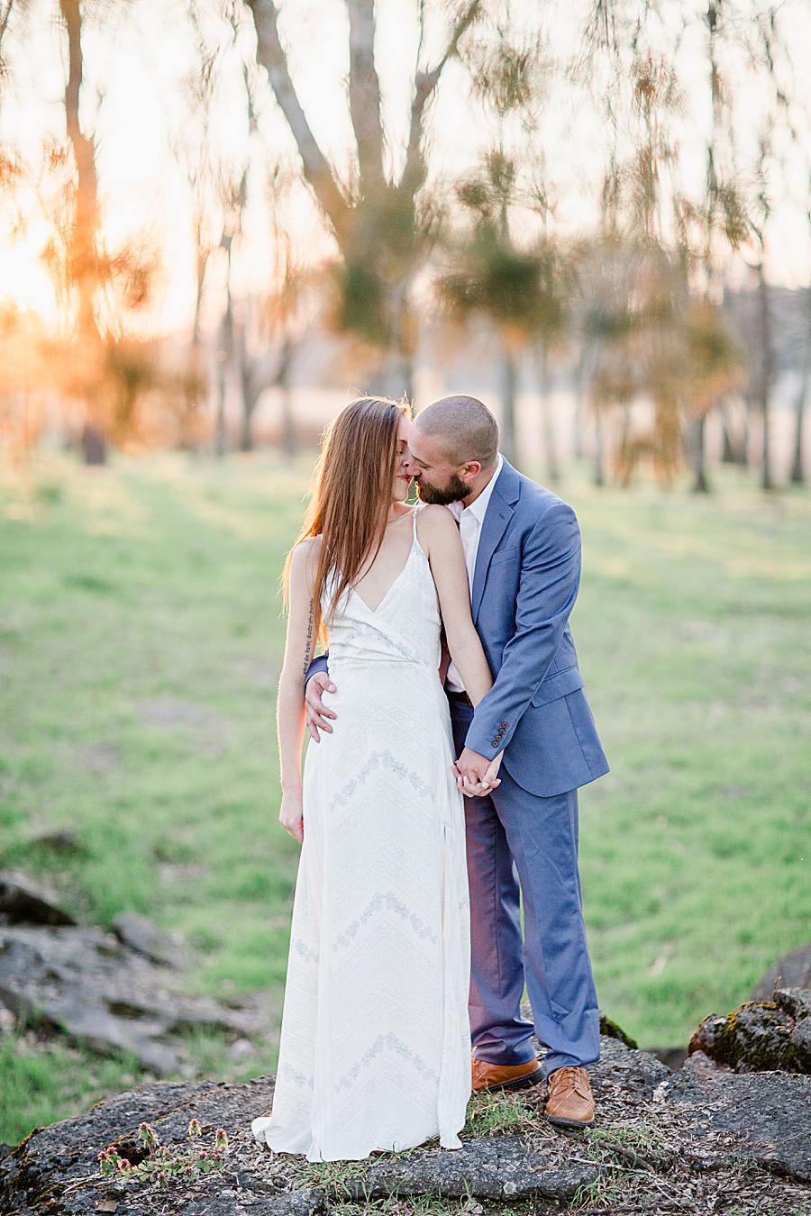 Kissing at this Marblegate Farm engagement by Knoxville Wedding Photographer, Amanda May Photos.