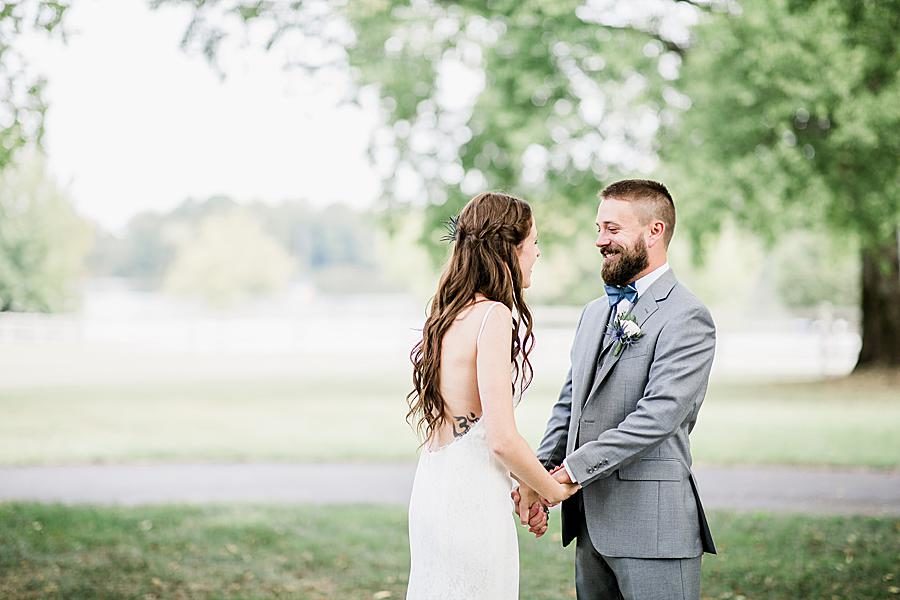 Holding hands at this Marblegate Farm Wedding by Knoxville Wedding Photographer, Amanda May Photos.