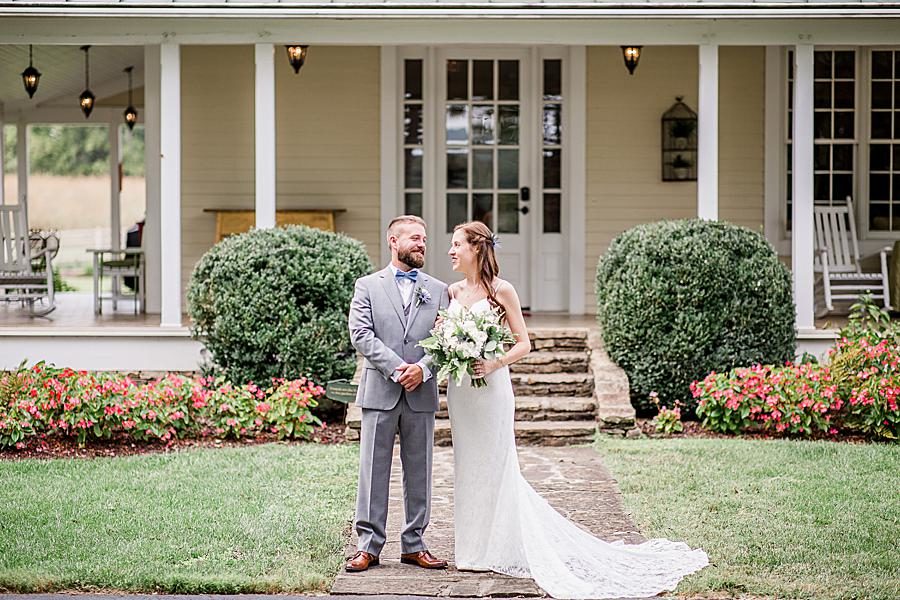 Looking at each other at this Marblegate Farm Wedding by Knoxville Wedding Photographer, Amanda May Photos.