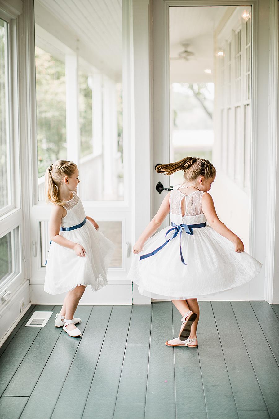 Twirling flower girls at this Marblegate Farm Wedding by Knoxville Wedding Photographer, Amanda May Photos.