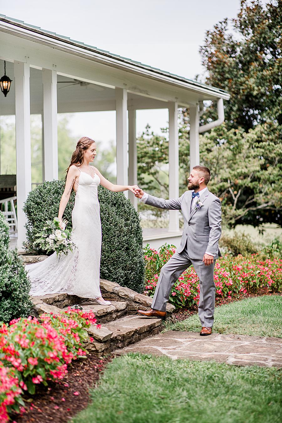 Walking down the stairs at this Marblegate Farm Wedding by Knoxville Wedding Photographer, Amanda May Photos.