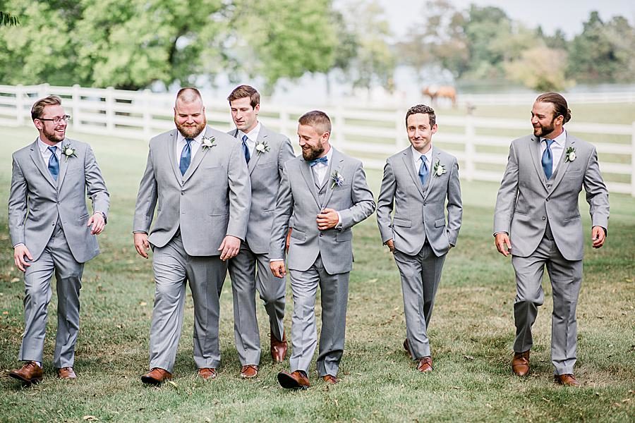 Groomsmen walking at this Marblegate Farm Wedding by Knoxville Wedding Photographer, Amanda May Photos.