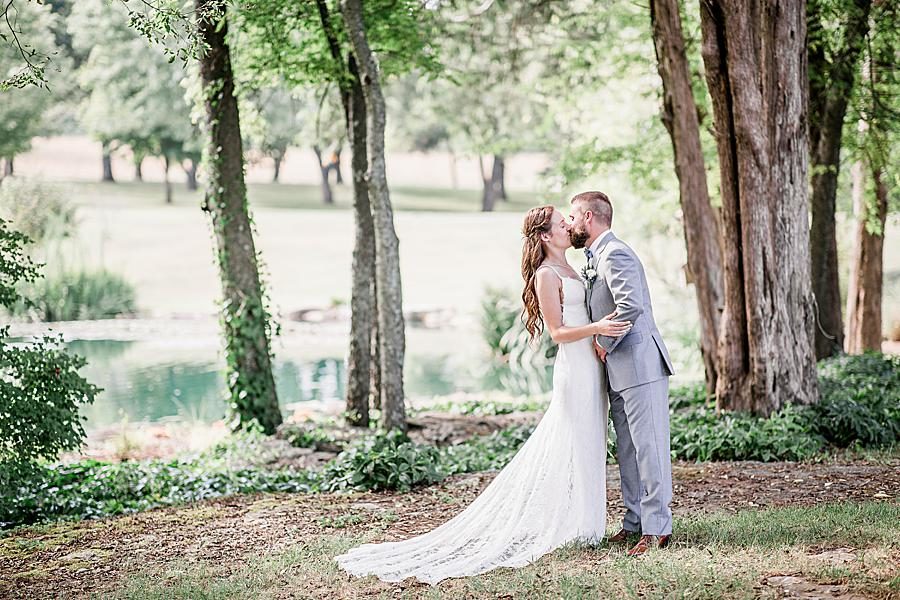 Kissing at this Marblegate Farm Wedding by Knoxville Wedding Photographer, Amanda May Photos.