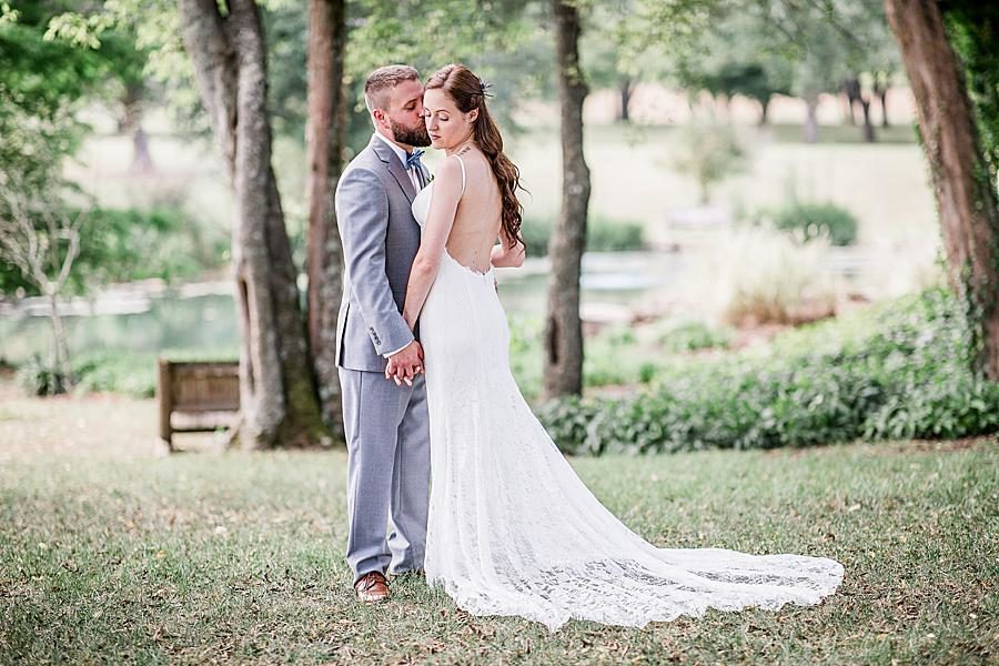 Kiss on the cheek at this Marblegate Farm Wedding by Knoxville Wedding Photographer, Amanda May Photos.