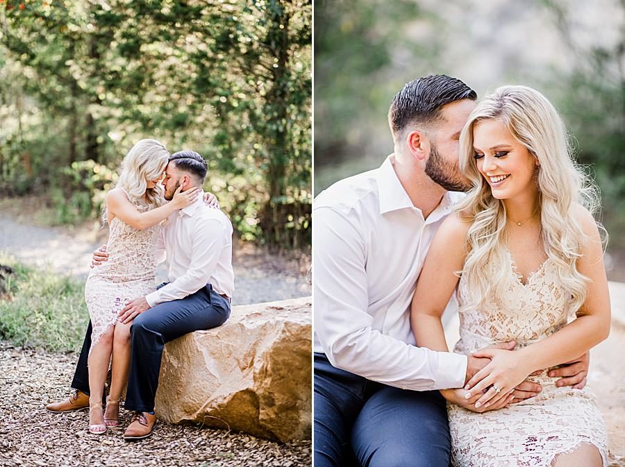 Sitting on a rock at this Meads Quarry engagement by Knoxville Wedding Photographer, Amanda May Photos.