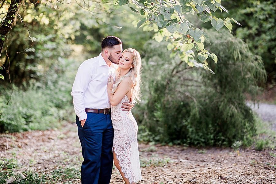 Kiss on the cheek at this Meads Quarry engagement by Knoxville Wedding Photographer, Amanda May Photos.