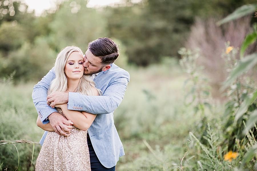 Hug from behind at this Meads Quarry engagement by Knoxville Wedding Photographer, Amanda May Photos.