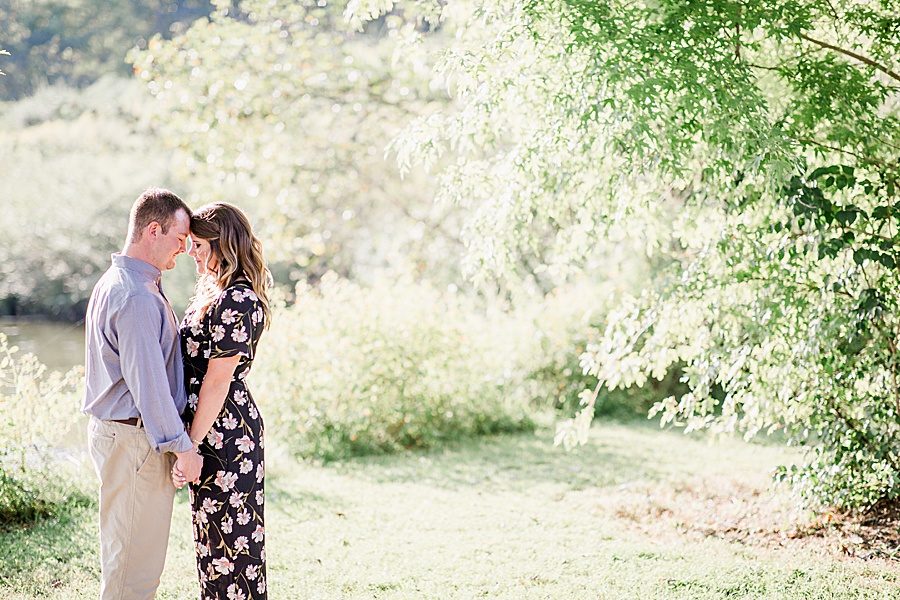 Foreheads together at this Melton Hill engagement session by Knoxville Wedding Photographer, Amanda May Photos.