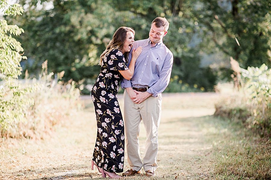 Belly laughing at this Melton Hill engagement session by Knoxville Wedding Photographer, Amanda May Photos.