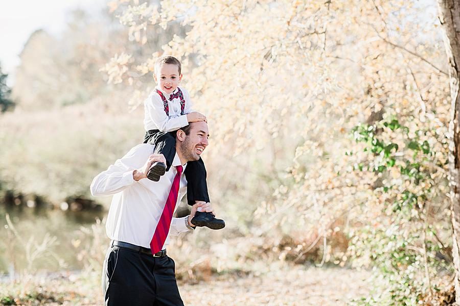 Son on dad's shoulders at this Melton Hill Park session by Knoxville Wedding Photographer, Amanda May Photos.