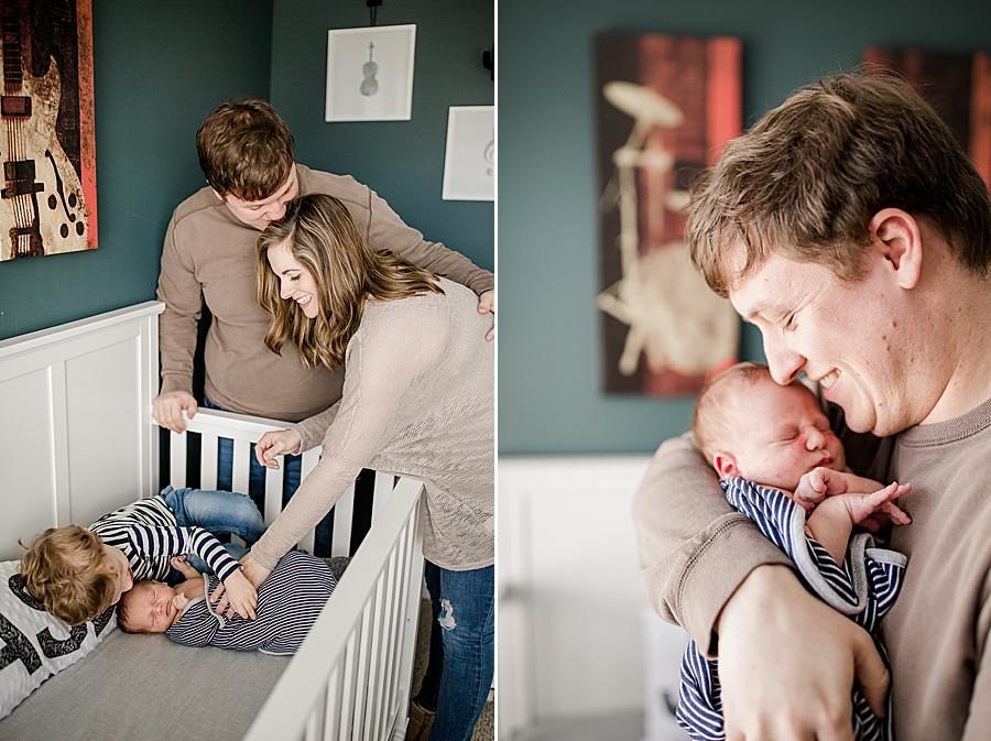 Holding the baby at this lifestyle newborn session by Knoxville Wedding Photographer, Amanda May Photos.