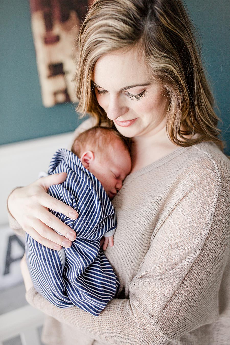 Swaddled at this lifestyle newborn session by Knoxville Wedding Photographer, Amanda May Photos.