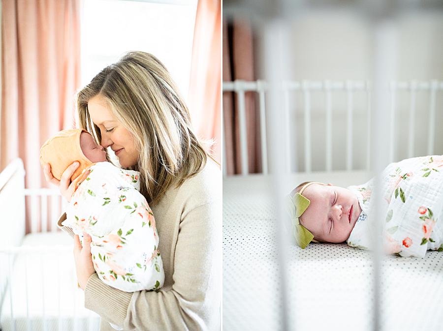 Baby wrapped in floral swaddle for newborn photos