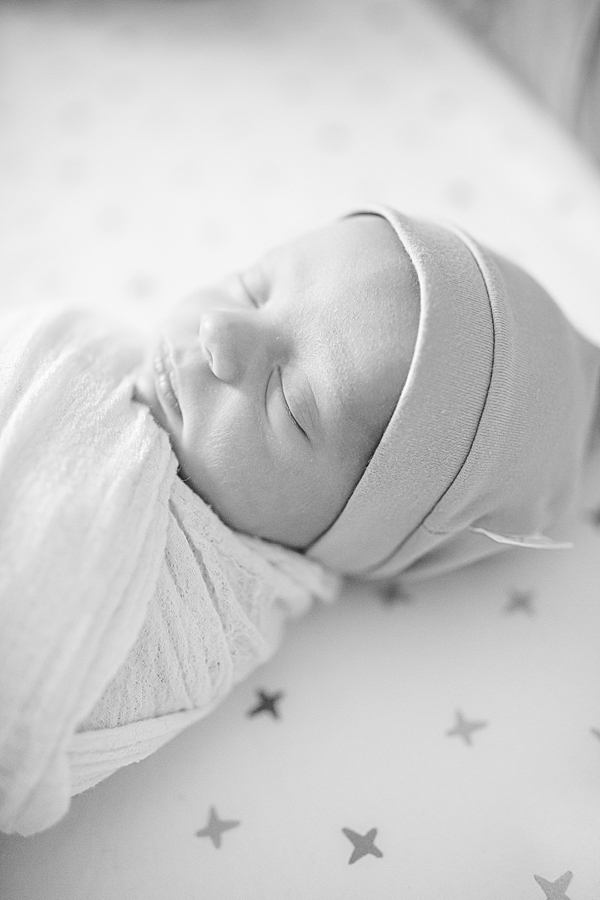 newborn in hat at newborn session