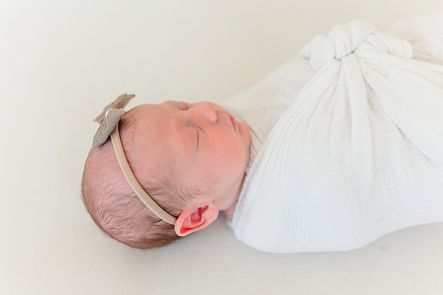 newborn in headband