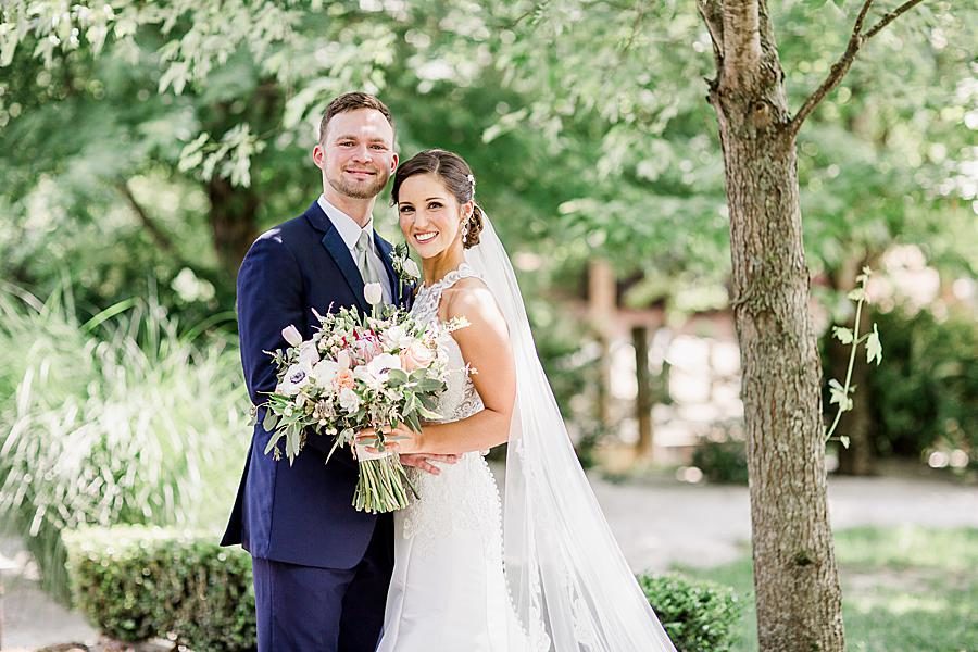 Bride and groom at this pavilion wedding by Knoxville Wedding Photographer, Amanda May Photos.
