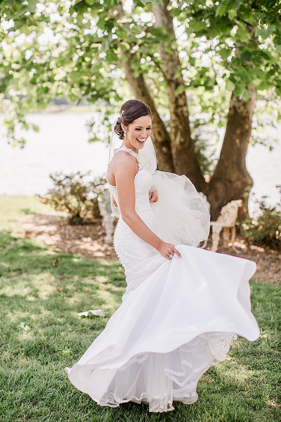 Twirling wedding dress at this pavilion wedding by Knoxville Wedding Photographer, Amanda May Photos.