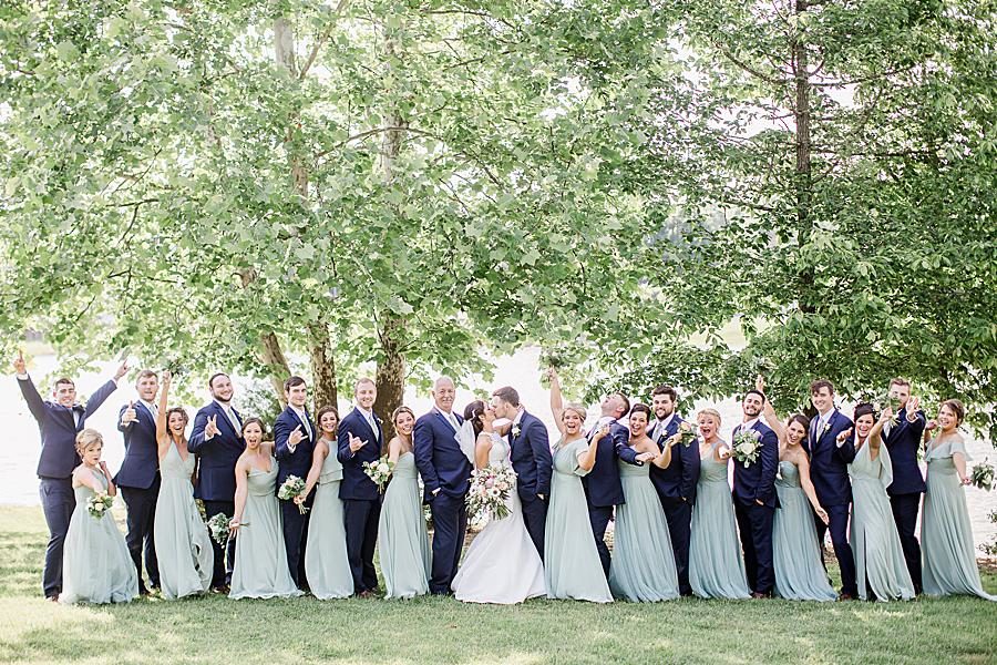 Wedding party posing at this pavilion wedding by Knoxville Wedding Photographer, Amanda May Photos.