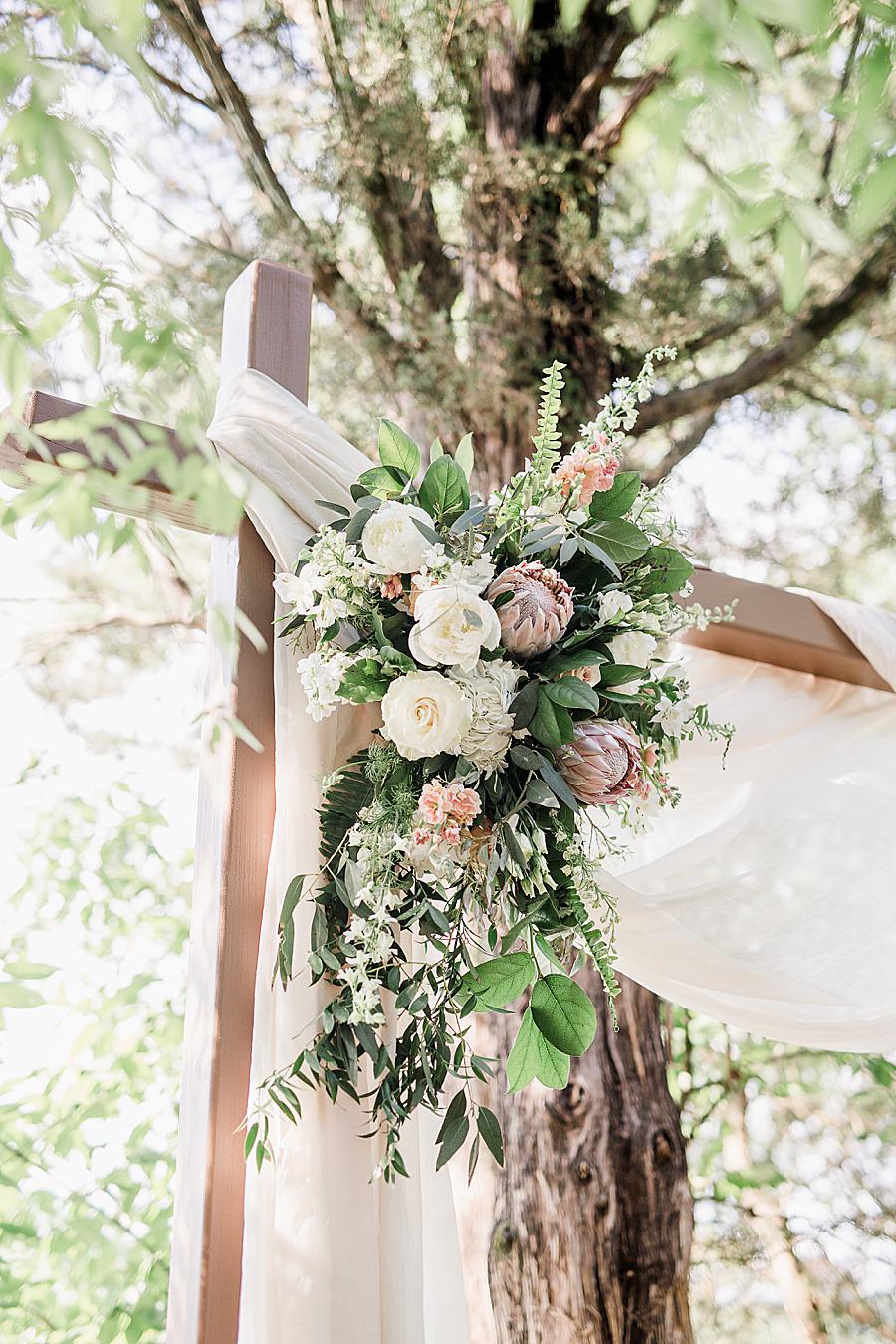Ceremony flowers at this pavilion wedding by Knoxville Wedding Photographer, Amanda May Photos.