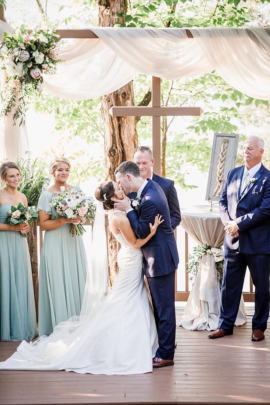 You may kiss the bride at this pavilion wedding by Knoxville Wedding Photographer, Amanda May Photos.