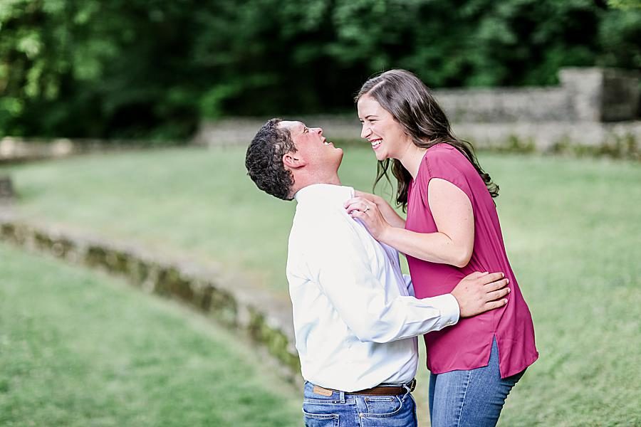 Couple laughing at this Percy Warner Engagement Session by Knoxville Wedding Photographer, Amanda May Photos.