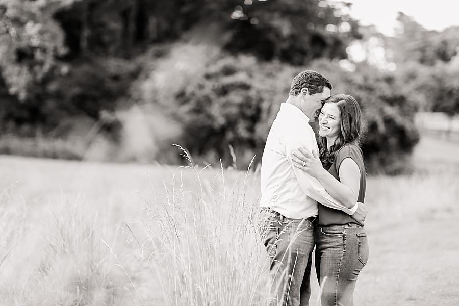 Snuggling and laughing at this Percy Warner Engagement Session by Knoxville Wedding Photographer, Amanda May Photos.