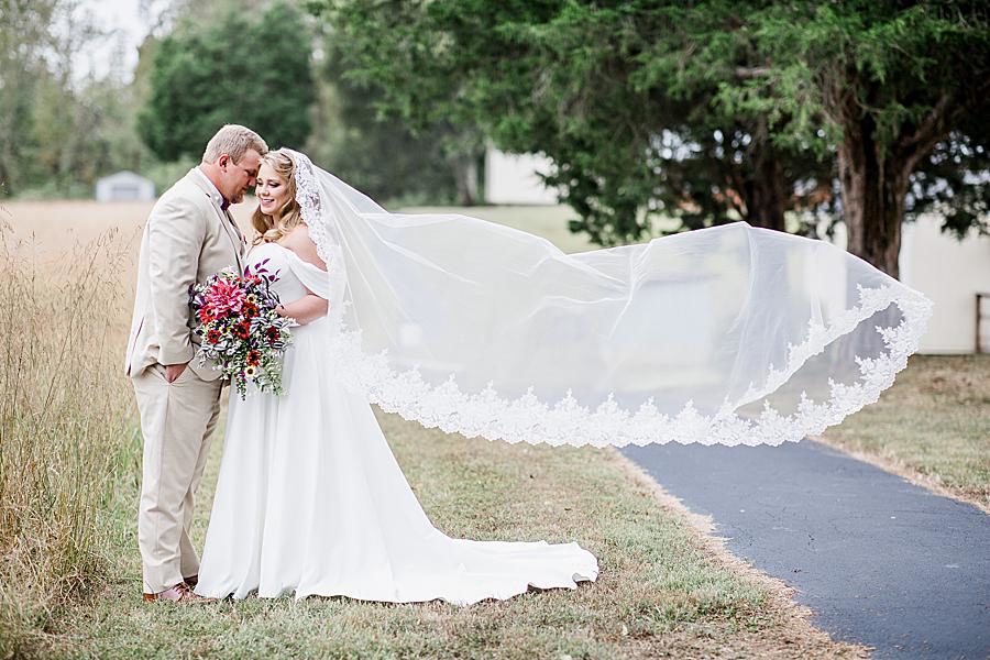 Flowy veil at this Pine Ridge Baptist Church wedding by Knoxville Wedding Photographer, Amanda May Photos.