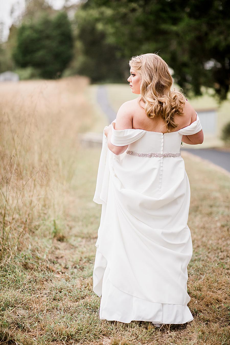 Drop shoulder wedding dress at this Pine Ridge Baptist Church wedding by Knoxville Wedding Photographer, Amanda May Photos.
