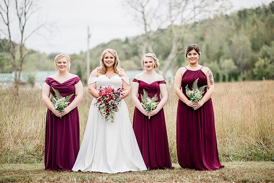 Merlot bridesmaids dresses at this Pine Ridge Baptist Church wedding by Knoxville Wedding Photographer, Amanda May Photos.