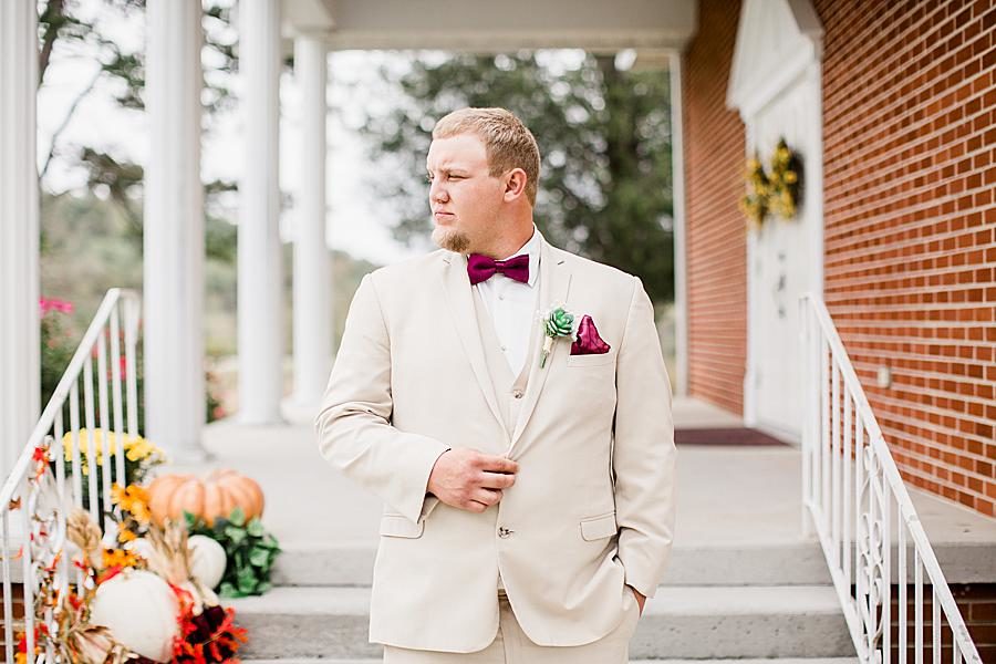 Hand on coat at this Pine Ridge Baptist Church wedding by Knoxville Wedding Photographer, Amanda May Photos.