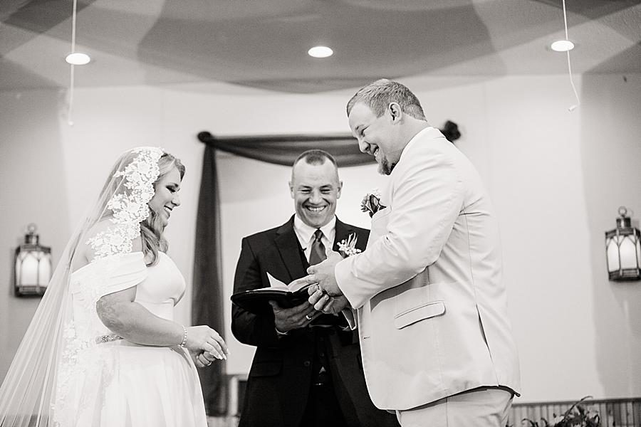 Exchanging vows by Knoxville Wedding Photographer, Amanda May Photos.