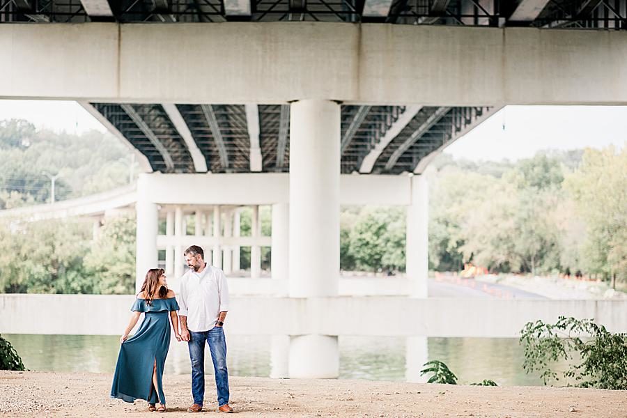 Holding hands at this Printshop Brewery engagement by Knoxville Wedding Photographer, Amanda May Photos.