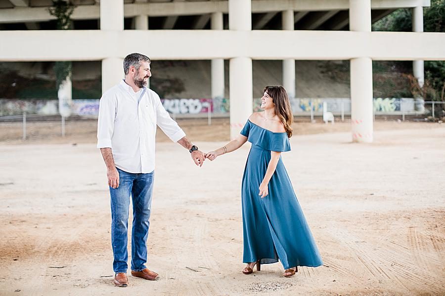 Blue dress at this Printshop Brewery engagement by Knoxville Wedding Photographer, Amanda May Photos.
