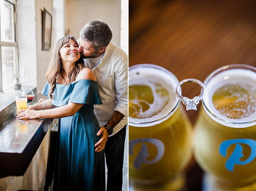 Engagement ring and beer at this Printshop Brewery engagement by Knoxville Wedding Photographer, Amanda May Photos.