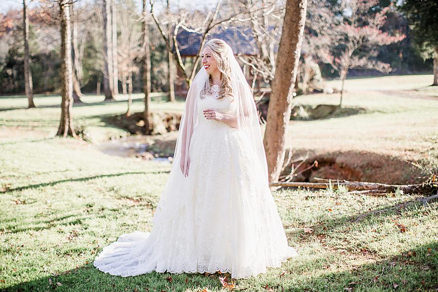 By the creek at this Ramble Creek Bridal Session by Knoxville Wedding Photographer, Amanda May Photos.