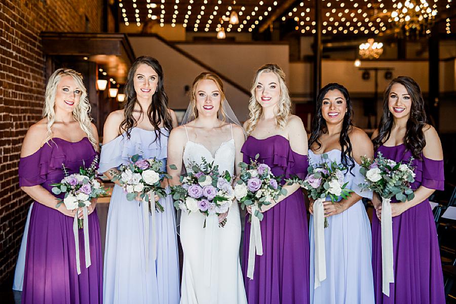 bridesmaids in different shades of purple